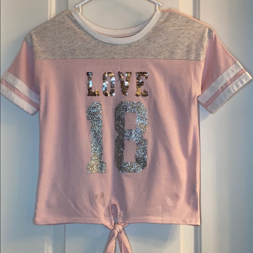 A Kids Place shirt